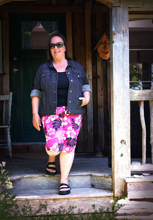 Woman wearing navy & pink spring ensemble made from Petite Plus Patterns 204 Jeans Jacket and 604 Capri Pant